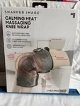 Sharper Image Calming Heat Massaging Knee Wrap New/open Box. Fixed Price $33.33.