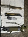 Maxam 12pc Survival Knife Set Alloy Handle Silver Blade Sheath Multifunction. Fixed Price $50.00.