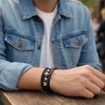 Black Leather Bracelet Braided Multi Strand Stainless Steel Cross Biyongde 8.5". Fixed Price $15.00.